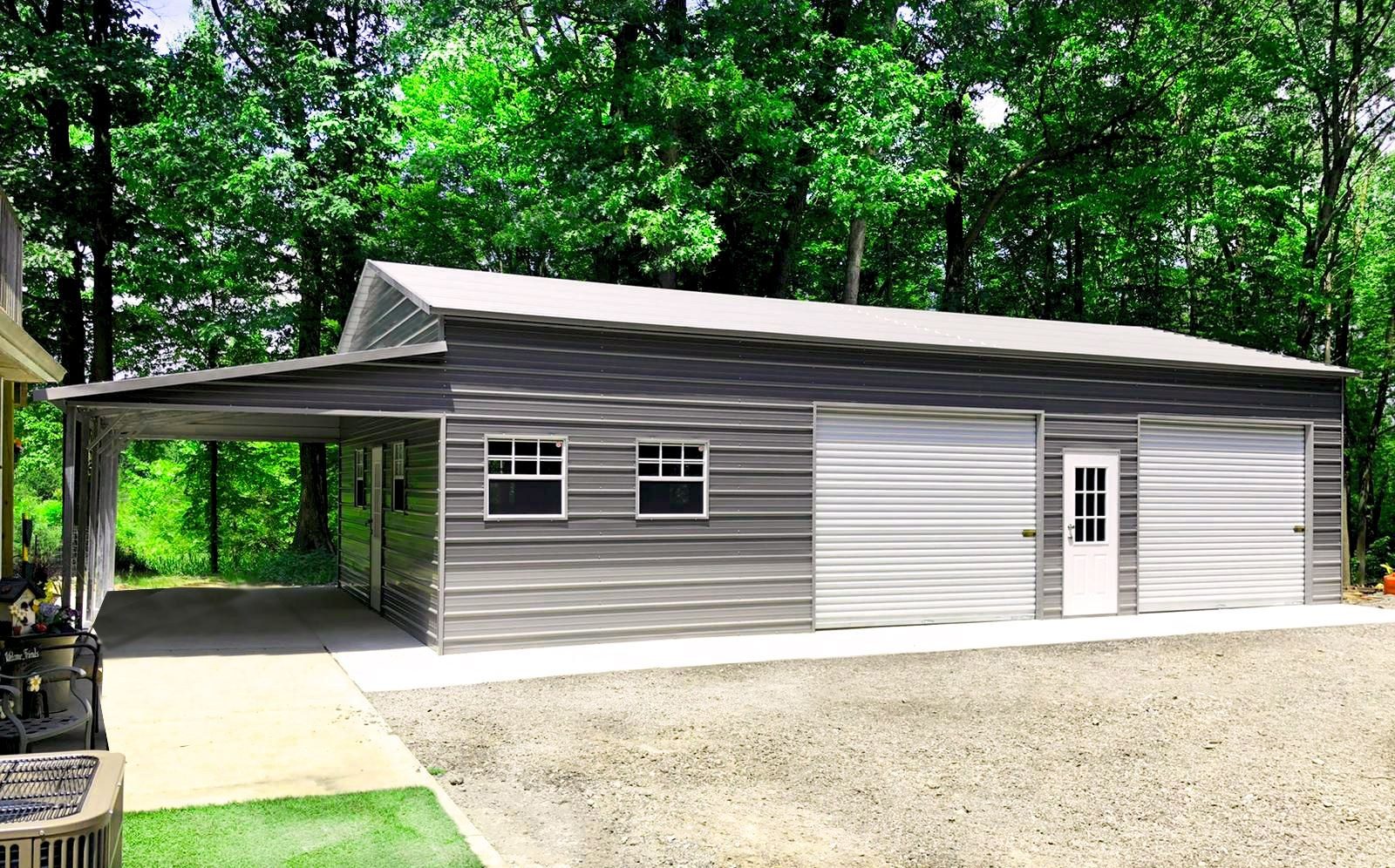 White steel garage with attached open carport lean-to on concrete pad