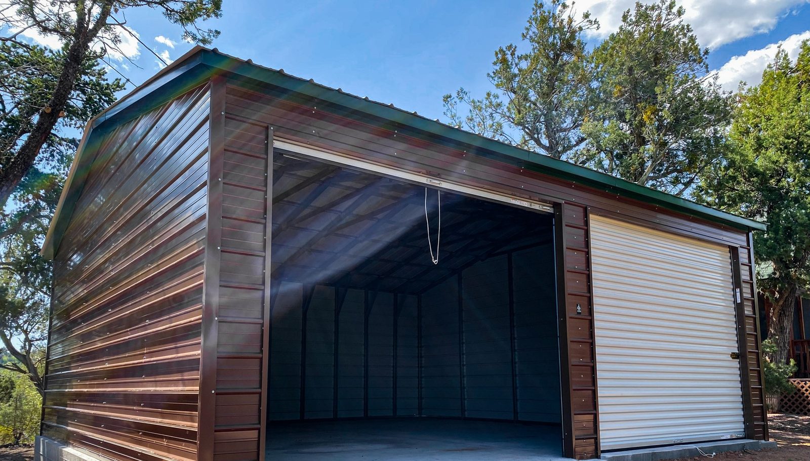 Premium wood-grain finish steel garage with white roll-up door