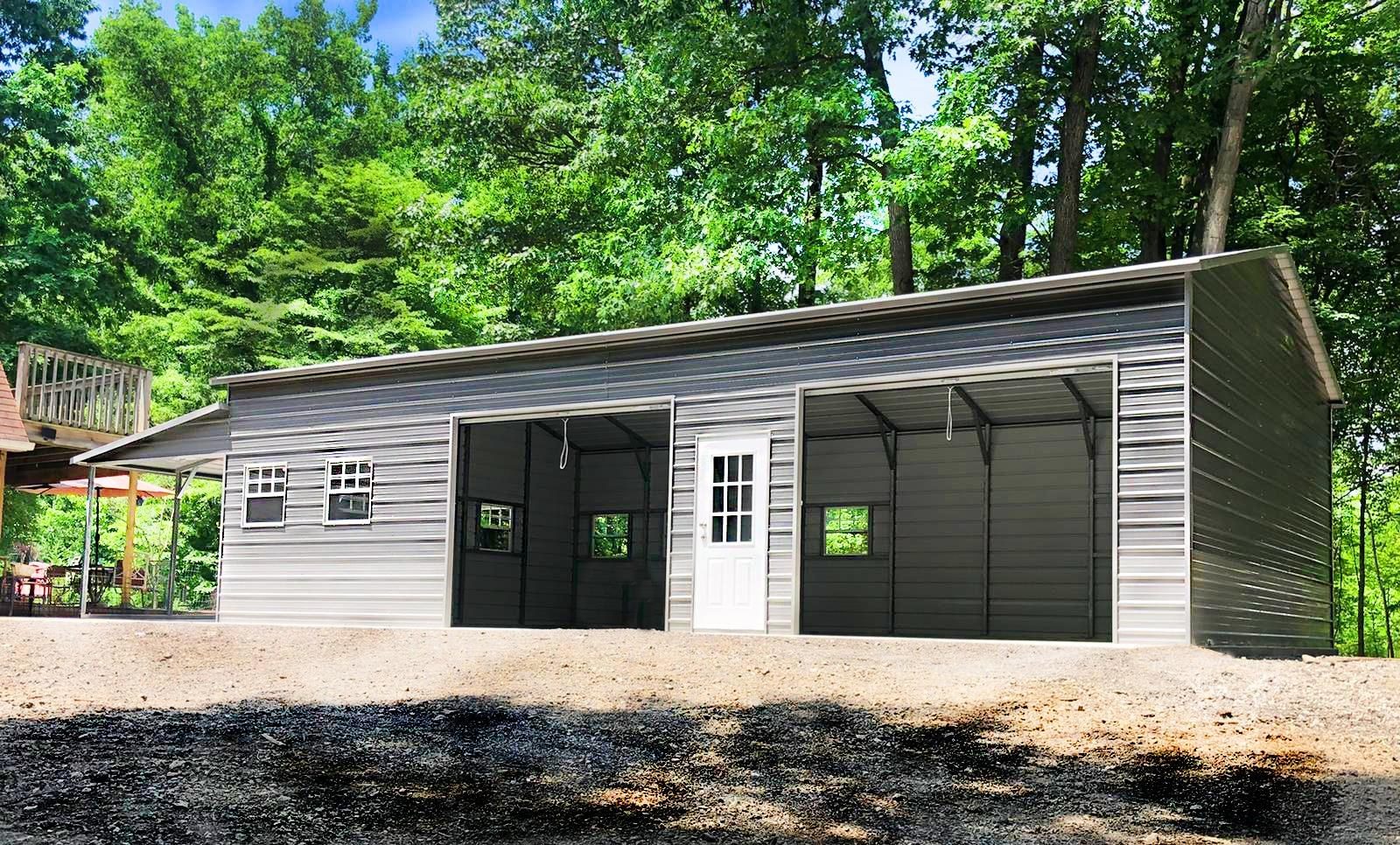 Gray steel workshop with enclosed lean-to, roll-up bays and windows